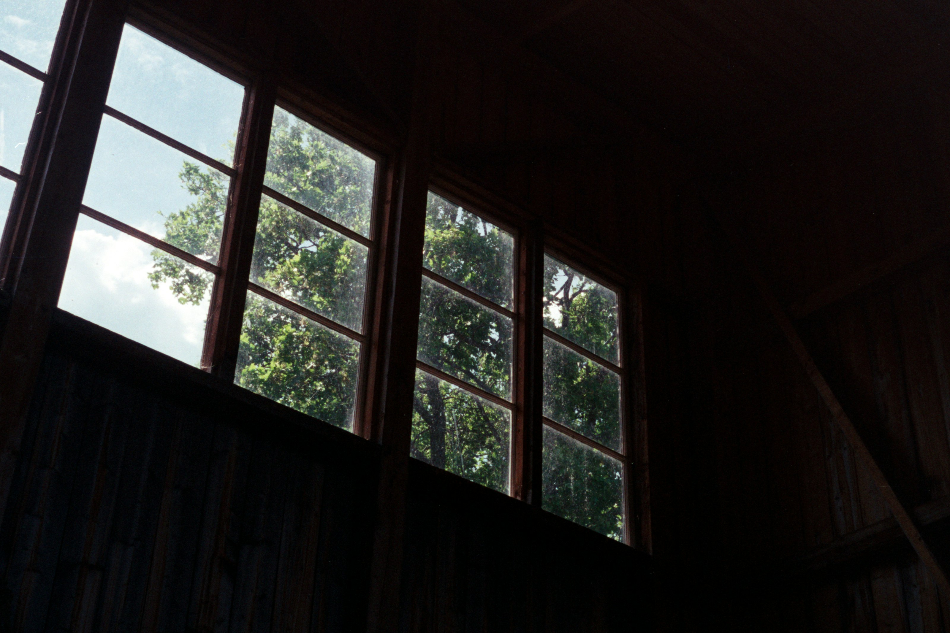 white wooden framed glass window